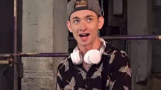 Leo Ocean restrains twink Jacob Daniels and strokes his cock