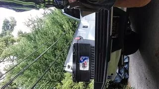 Construction dad tak8ng a break, smoking a cigar