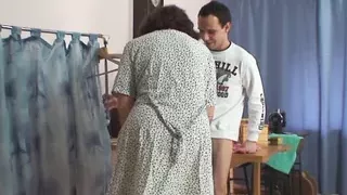 Guy fucks old tailoress on the floor