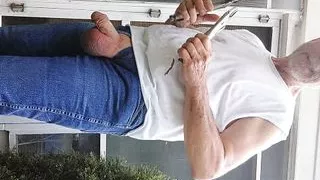 Frustrated mechanic takes a break