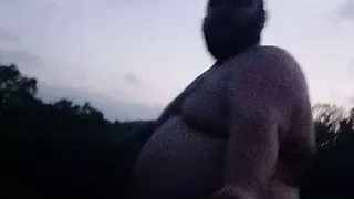 Mofo2121 walking around the park in a thong