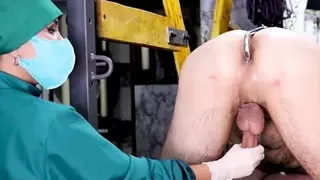 Asian Dominatrix gives Anal Hook treatment