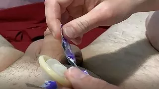 She jerks me off with a condom