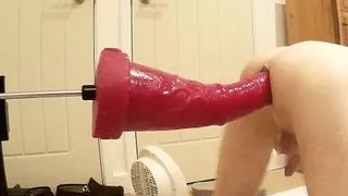 Big Red giant dildo on the Fucking Machine