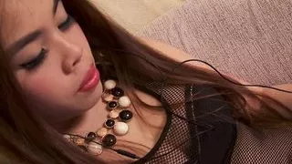 Tan is a sexy Asian nymphomaniac and exhibitionist