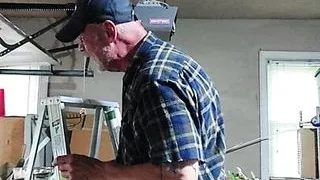 Repairing garage door to catch a voyager