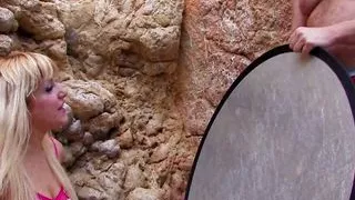 An exciting fuck in the rocks with a horny blonde!