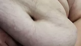 Chubby playing with cock and balls