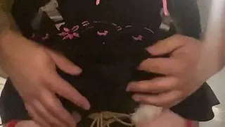 Crossdressing with 4 layers on with breast bondage tied as a harness and attached to my collar