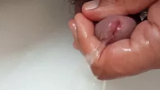 playing with peephole while I'm pissing