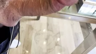 Big dick cumshot on glass table