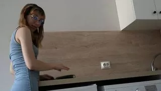 Kinky girl fucks herself with a large cucumber