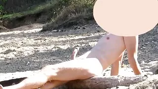 Nudist's hard dick looking around at beach