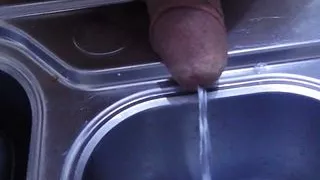 pissing in the sink