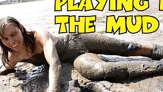 Nude Girl Playing in the Mud