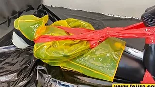 Fejira com Fetish girl yellow plastic mackintosh bondage orgasm