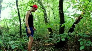 Twink is peeing of his fat cock in public