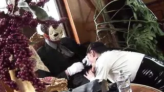 A brunette satisfies the masked man's horny cravings