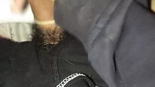 Hairy hispanic cumming into a condom
