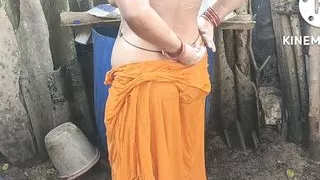 Anita yadav bathing outside with hot