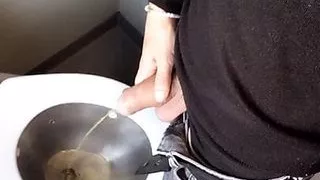 Piss with low hanging balls on the train toilet