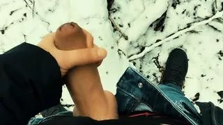 Young uncut big dick cumshot in the snow POV