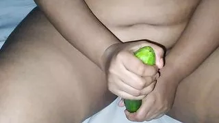 Desi single girl gets sexually excited and has sex with cucumber