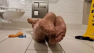 Public restroom pantie strip and nude play. Creampie on feet