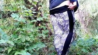 Lush MILF golden shower solo in nature