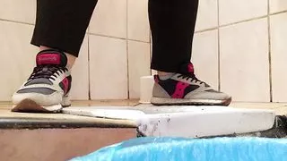 bbw milf pissing and wiping her pussy in a public toilet