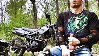 Handsome BIKER while riding a MOTORCYCLE in the forest JERKS OFF and CUMS in public