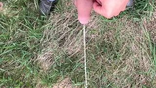 Piss public Uncut cock with rings on balls