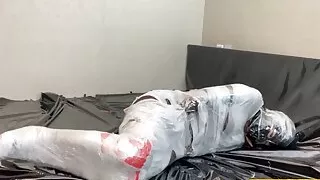 Fejira com Fetish girl mummification wrap