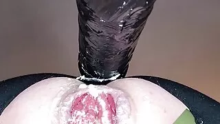 Machine dildo with green tape 2