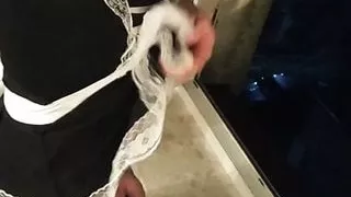 Crossdresser exposed in open window