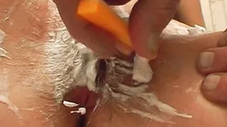 A slim German babe gets her hairy pussy shaved by her dude