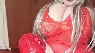 Susi wearing red fishnet red boots teasing lick my boots