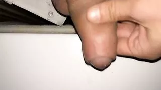 Twink piss out of a window in an entrance of apartment building - Rainy night