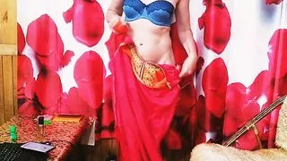 A milf strips in a secret webcam show.