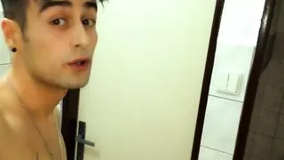 Twink risky jerks cock at the public toilet and cums on occupied cabin