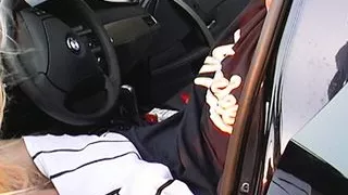 Busty German babe with blonde hair sucking a cock in the car