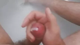 I masturbate a huge dick in the shower and cum. Lots of sperm.