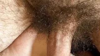 Playing with my all-natural pubes with a semi-erect dick